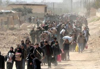 Empieza evacuación de rebeldes y civiles de Guta Oriental en Siria